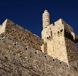 A view of the Old City from a Jerusalem rooftop, dead engineers, a church with Jewish symbols and a significant arrow, all part of a short but jam full tour from Jaffa Gate to the Western Wall